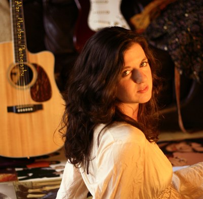 Clara Rose and guitar
